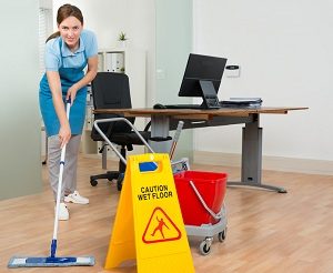 Woman Cleaning Office